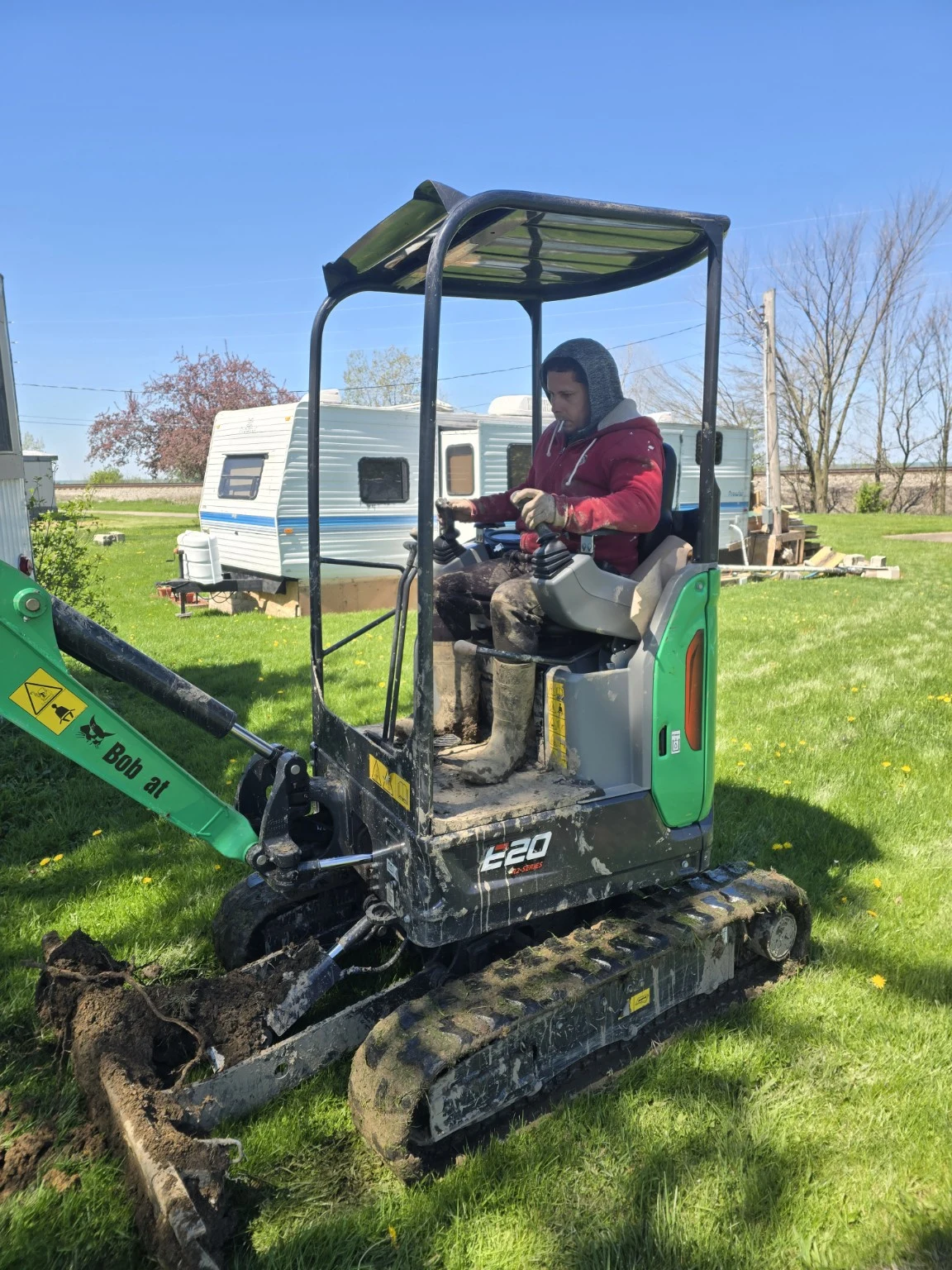 Mini excavator on a residential property